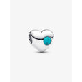 Close-up of PANDORA Turquoise Stone Heart Charm with genuine turquoise gemstone in sterling silver.