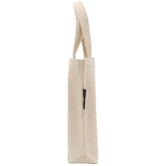 Carry your daily essentials with the Penguin Random House Bookworm Mini Tote Bag.