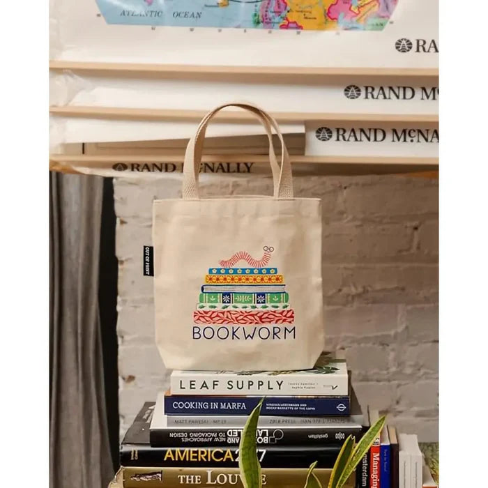 Carry your daily essentials with the Penguin Random House Bookworm Mini Tote Bag.
