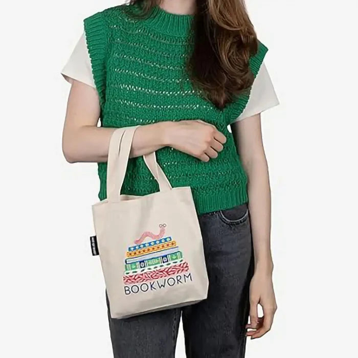 Carry your daily essentials with the Penguin Random House Bookworm Mini Tote Bag.