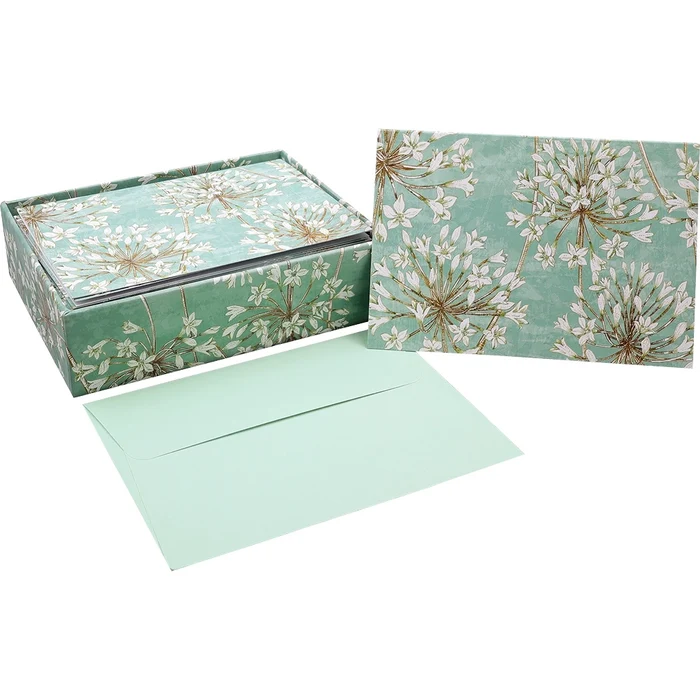 Floral-patterned box and card on a white background