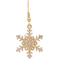 Gold snowflake earring with clear gemstones on a white background