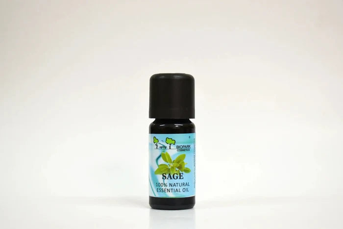 Bottle of Sage essential oil with a black cap on a white background