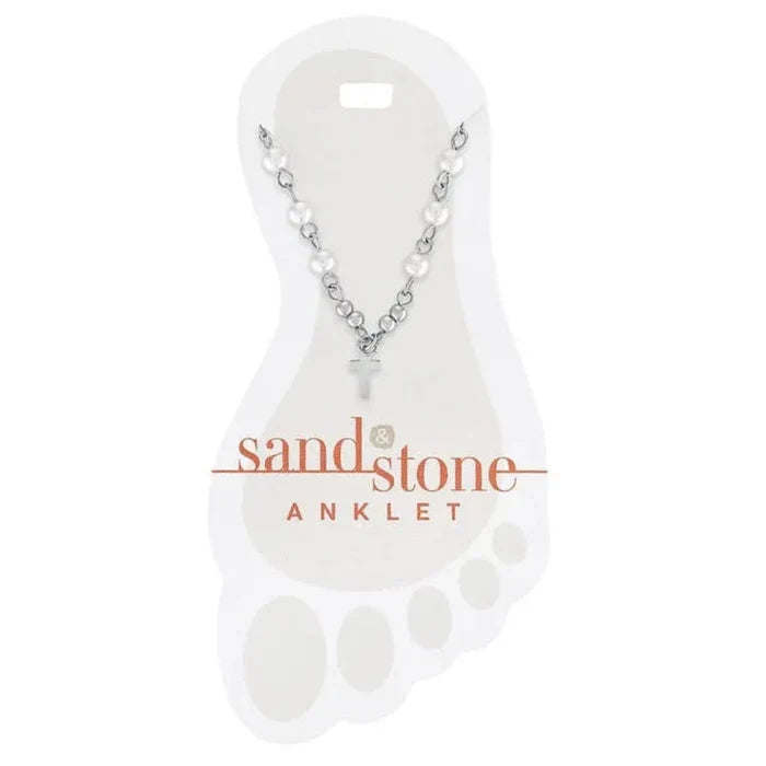 Sand & Stone anklet on a clear plastic stand with branding.