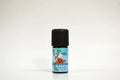 Bottle of Sandalwood essential oil on a white background