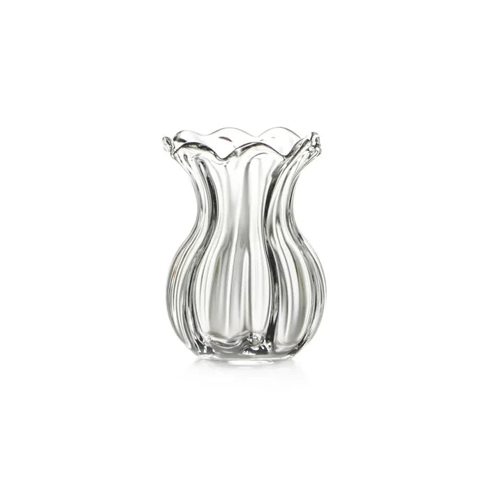 A clear glass vase featuring a wavy design, showcasing its elegant and fluid shape.