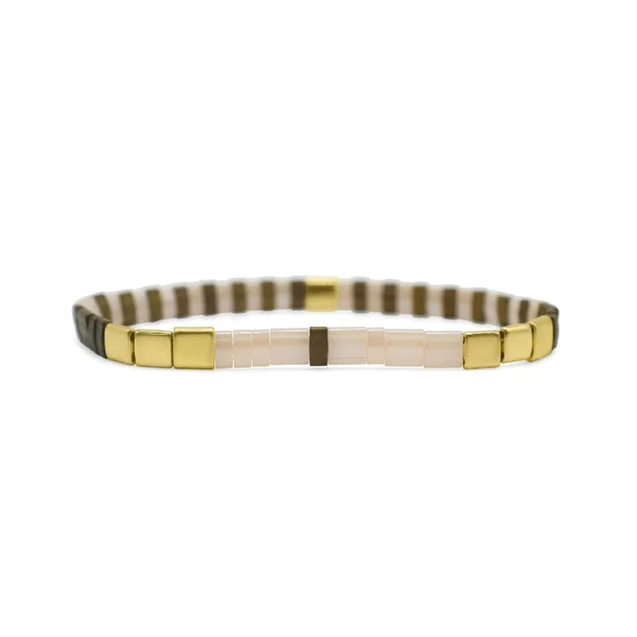 A bracelet crafted from a single strand of white and brown glass beads, showcasing a simple yet elegant design.