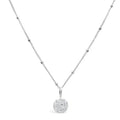 This elegant piece features a delicate round pavé disk pendant, encrusted with shimmering crystals for a subtle yet eye-catching finish.
