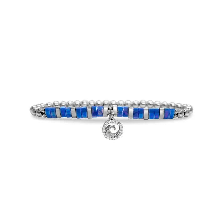 A bracelet featuring blue stones and a silver charm, elegantly designed for a stylish accessory.