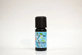 Tea tree essential oil bottle with a blue label on a white background