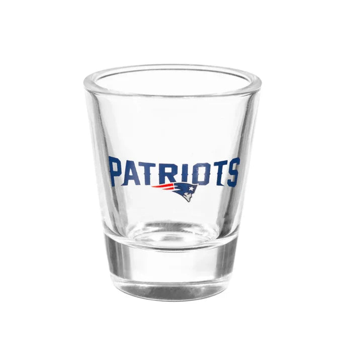 Clear shot glass with 'Patriots' text and logo on a white background