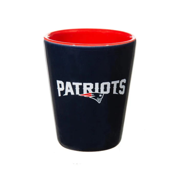 Navy blue mug with red interior and 'Patriots' text on a white background
