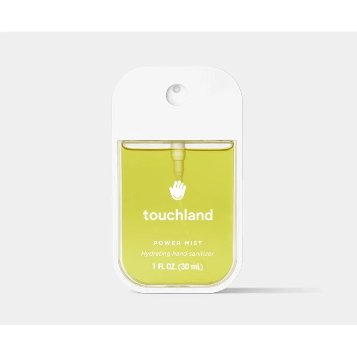 Touchland Vanilla Blossom Power Mist hydrating hand sanitizer with yellow liquid in sleek white case.