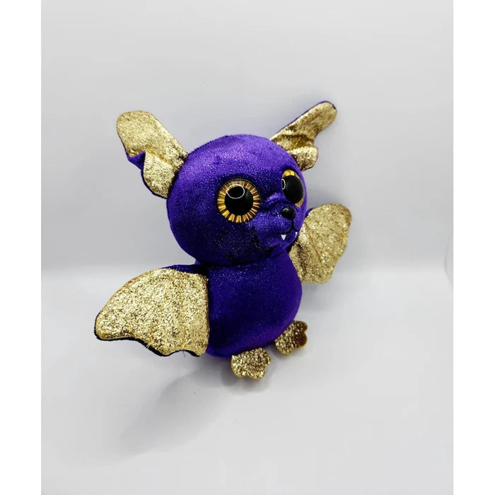 Purple plush toy with gold wings on a white background