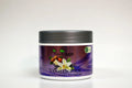 Jar of Vanillicious scented organic shea butter on a white background