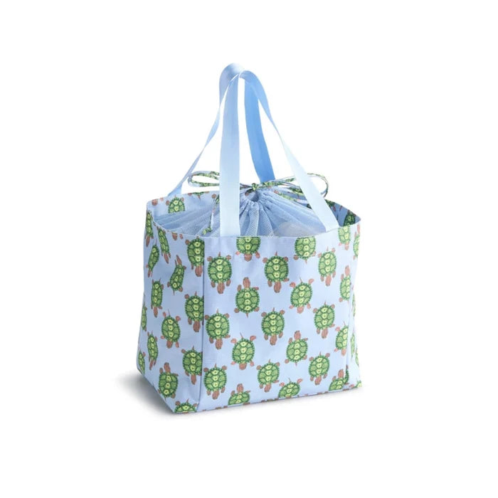 A blue tote bag adorned with a turtle design and equipped with a blue handle.
