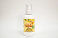 Bottle of organic walnut oil with a yellow label on a white background