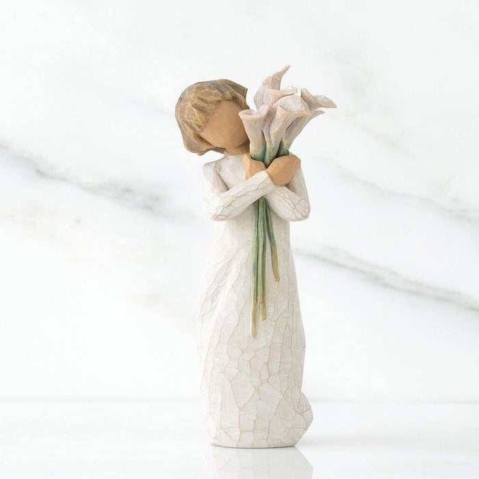 "Willow Tree Beautiful Wishes Figurine – Hand-painted resin sculpture of woman holding white calla lilies, symbolizing hope, love, and healing"