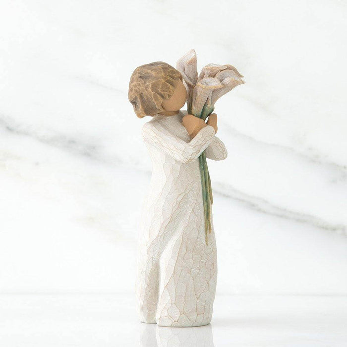 "Willow Tree Beautiful Wishes Figurine – Hand-painted resin sculpture of woman holding white calla lilies, symbolizing hope, love, and healing"