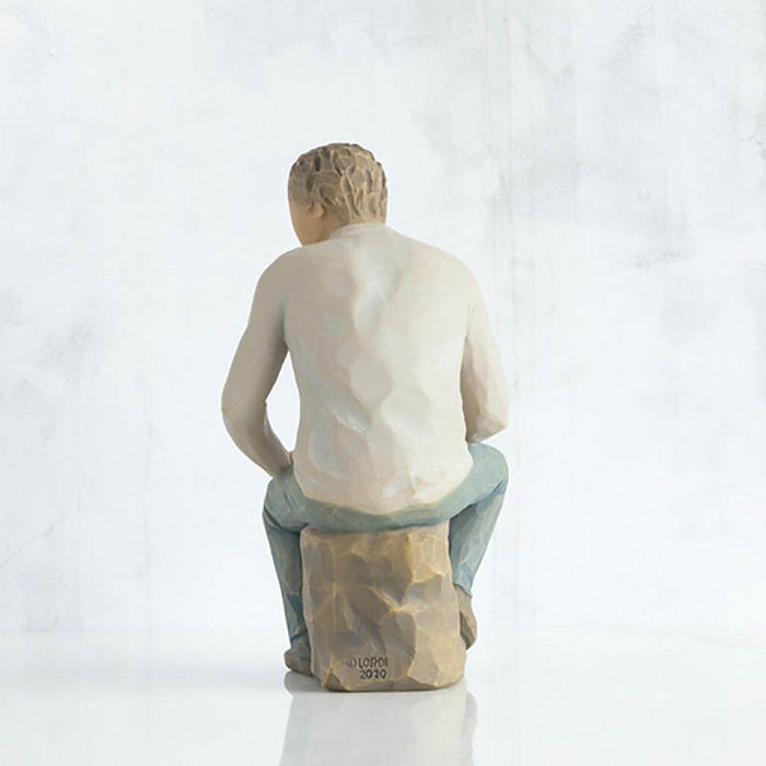 "Willow Tree My Guy figurine of a seated man in a relaxed pose, symbolizing quiet strength and companionship"