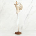 "Willow Tree Song of Joy Figurine – Hand-painted angel with wire wings in dancing pose on metal stand, expressive holiday decoration"