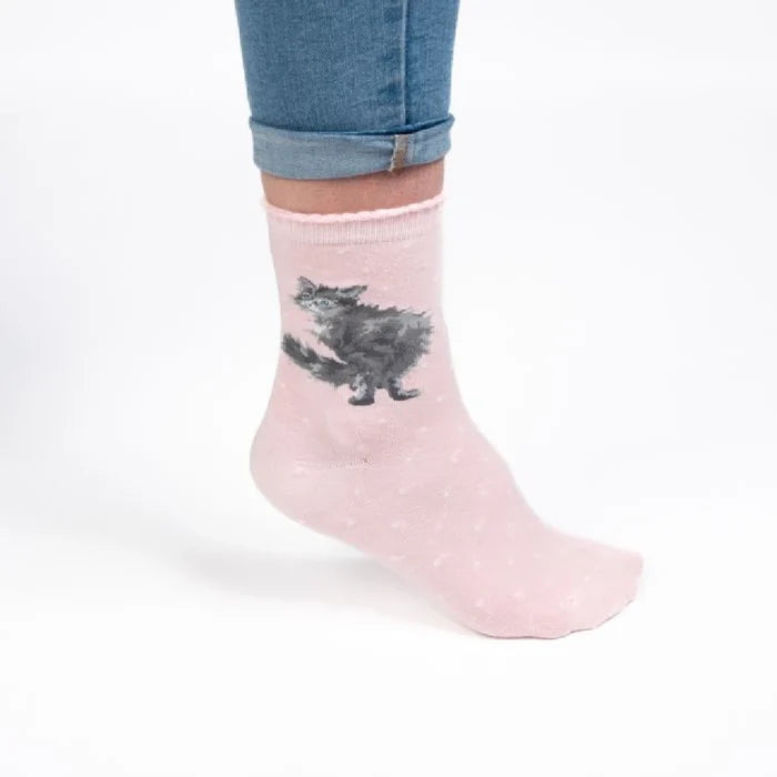 A pair of socks showcasing a whimsical cat graphic.