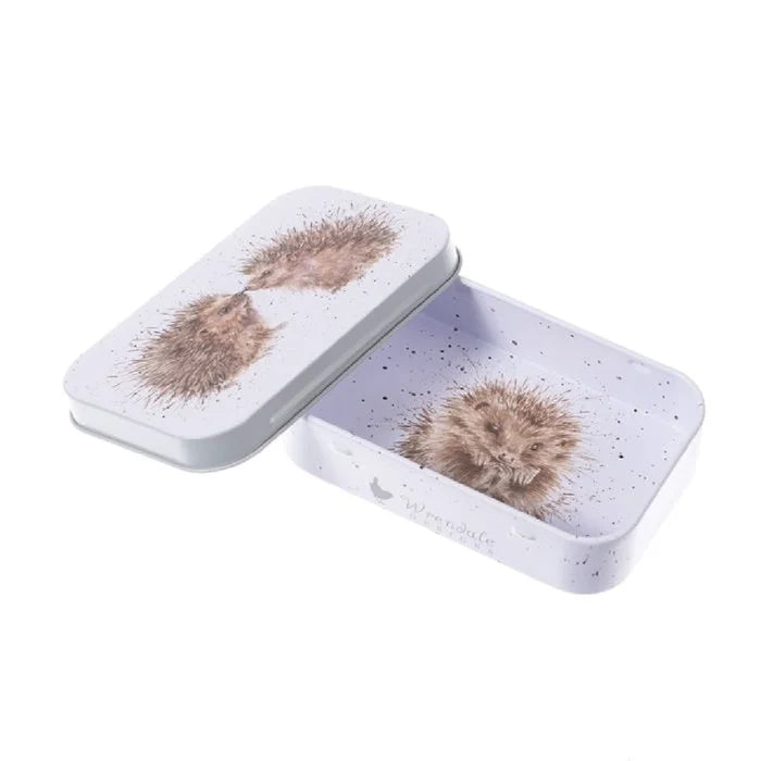 A tin box adorned with a cute hedgehog design, showcasing its whimsical artwork.