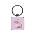A pink keychain featuring a cute rabbit design, adding a playful touch to your keys.