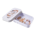 A decorative tin box featuring a whimsical cat design on its surface.