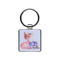 A square keychain featuring a colorful painting of a bird surrounded by vibrant flowers.