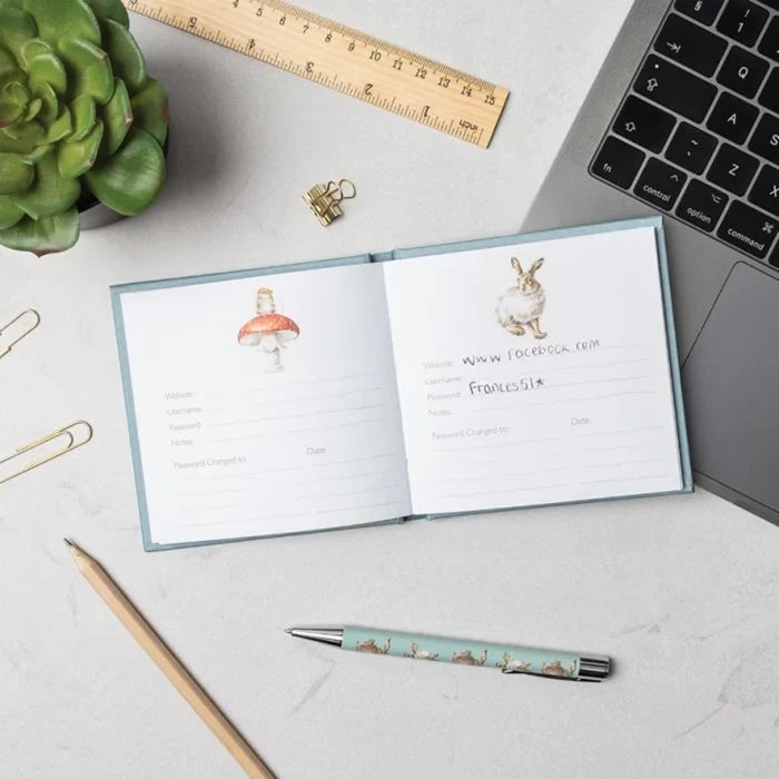 A notebook adorned with three charming fox illustrations, showcasing their playful nature.