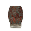 Close-up of the Yankee Candle Autumn Leaves Plug-In Diffuser with embossed leaf design in bronze and copper finish.